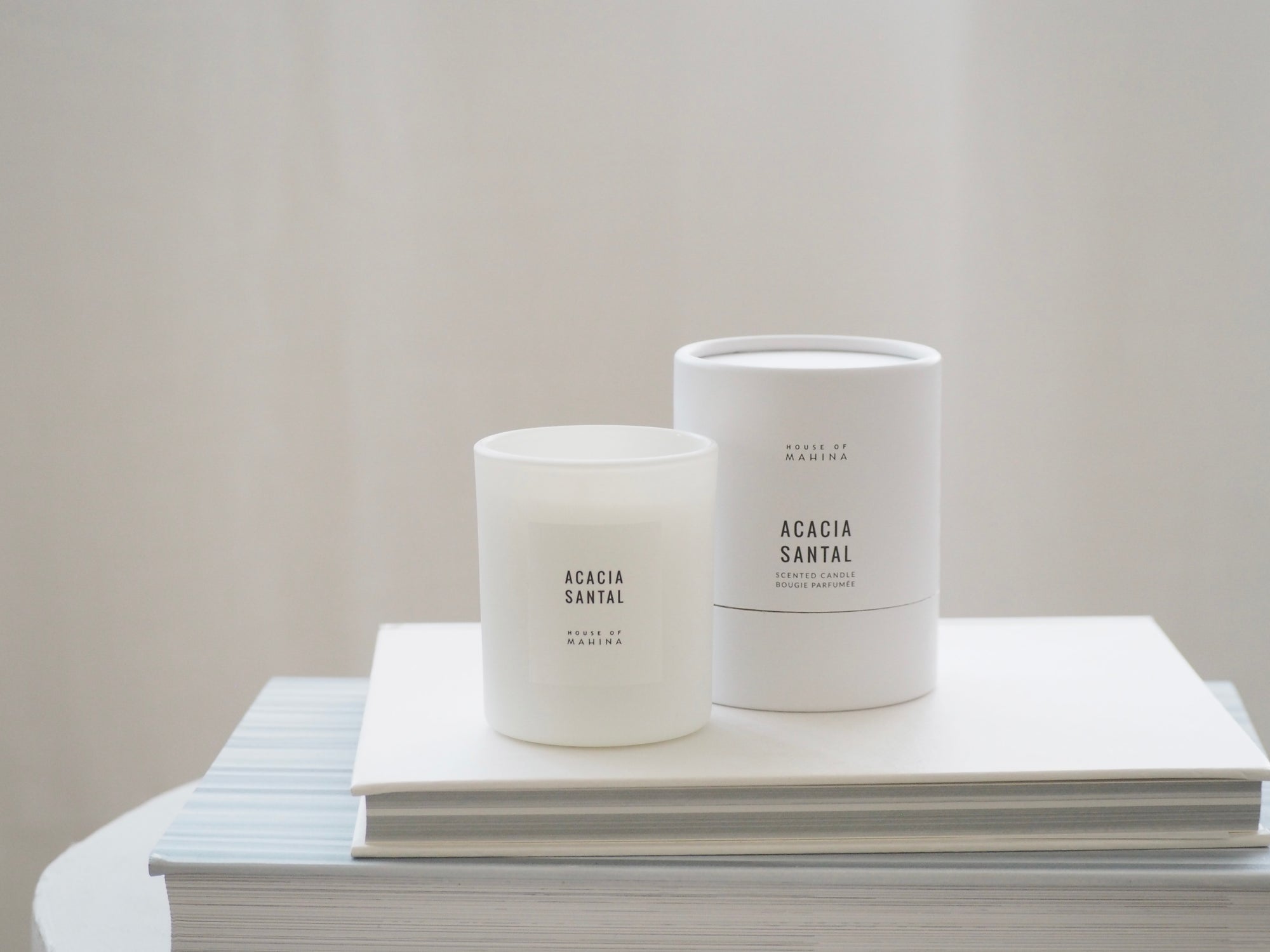 House of Mahina Acacia Santal Petite Candle and Packaging