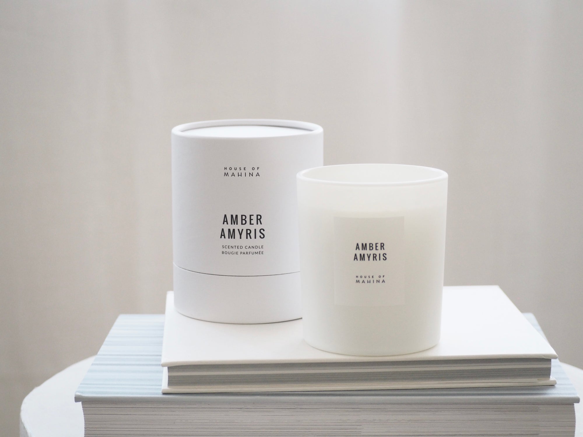 House of Mahina Amber Amyris Classic Candle and Packaging