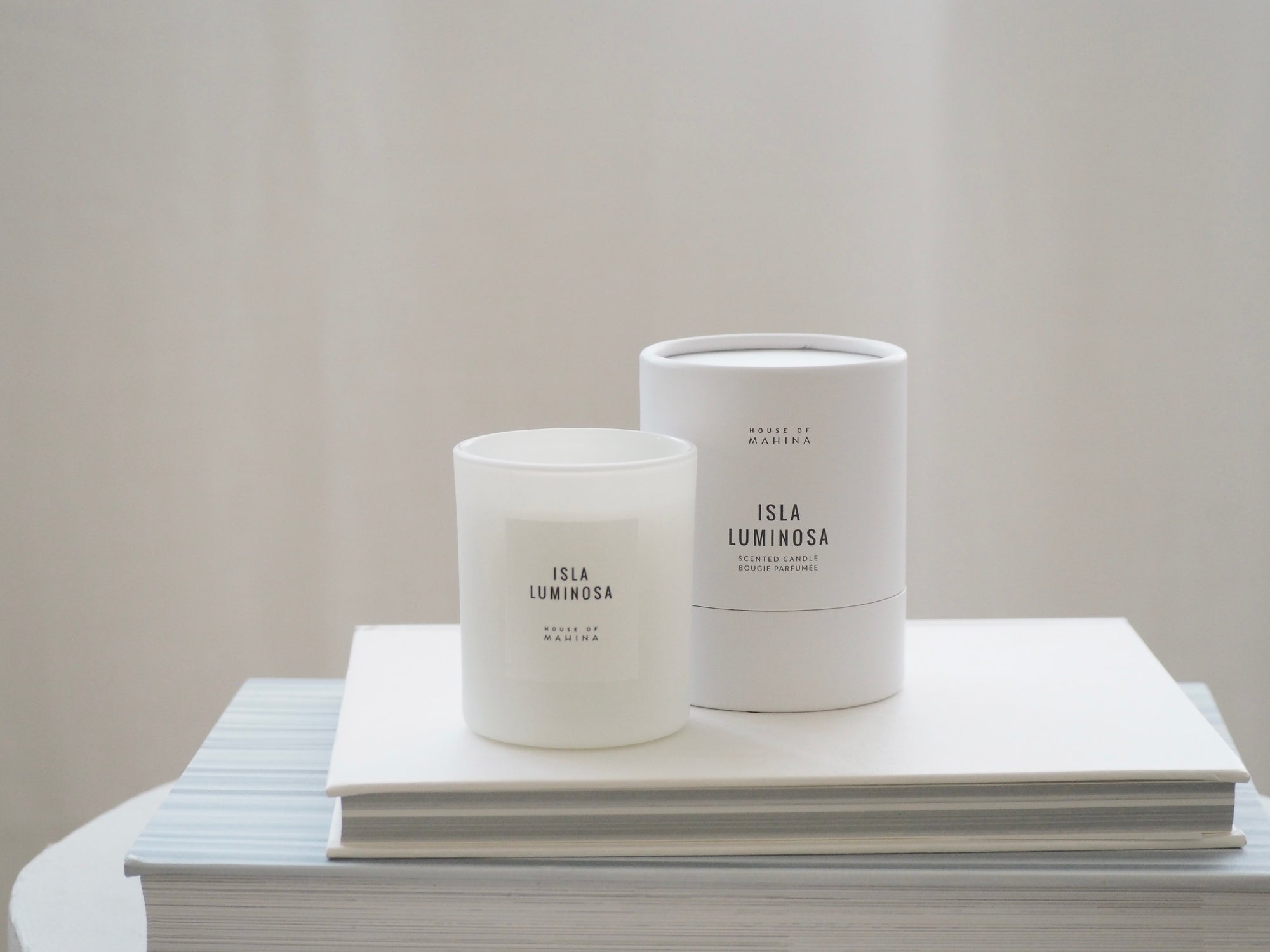 House of Mahina Isla Luminosa Petite Candle and Packaging