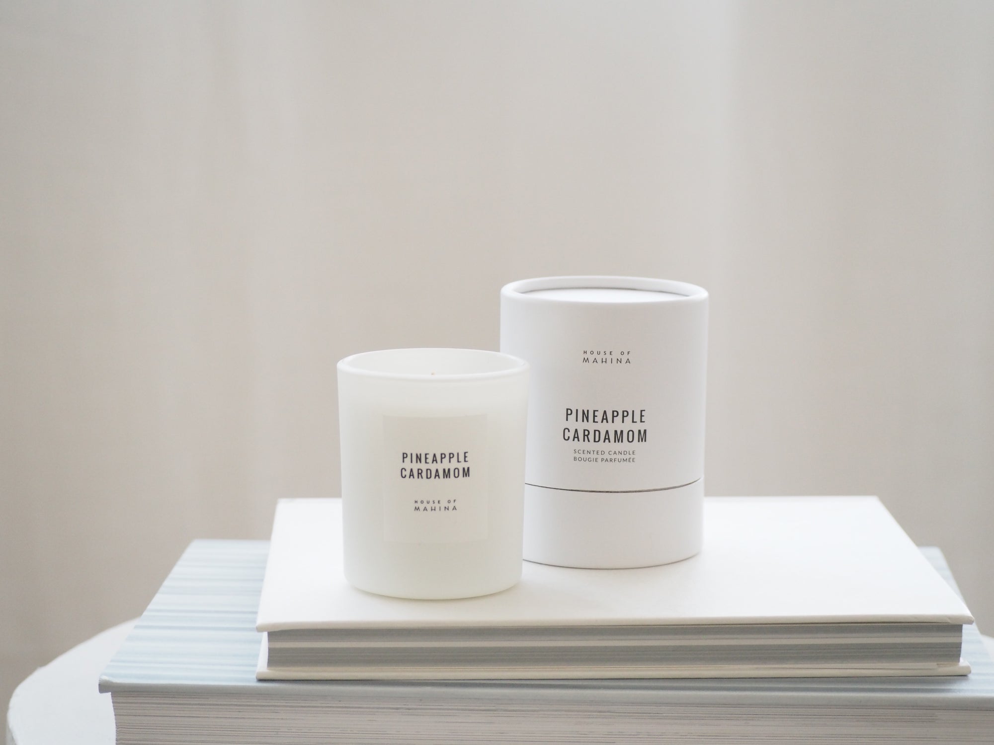 House of Mahina Pineapple Cardamom Petite Candle and Packaging